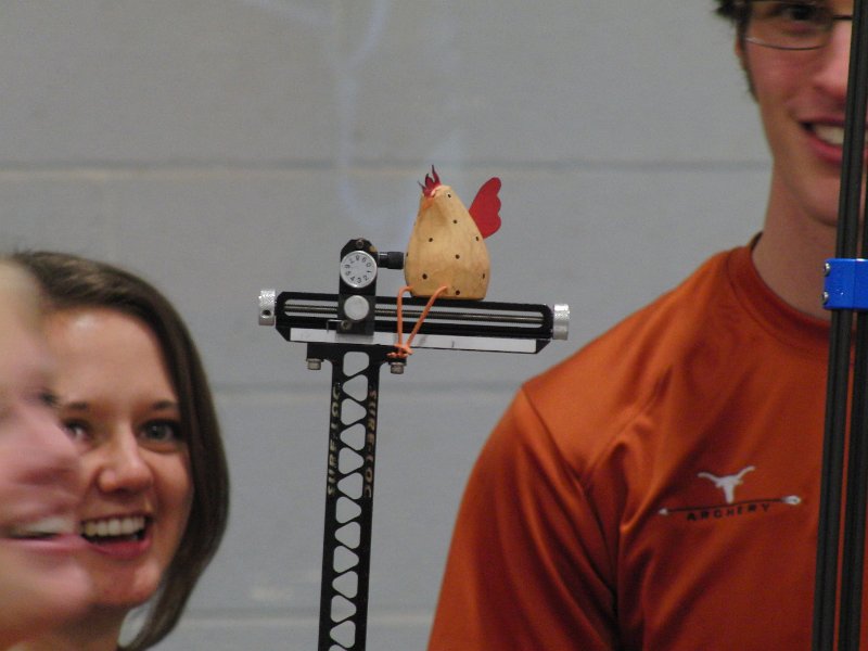 CIMG5720.JPG - Sheng-Cheng (Hans) Huang carries this little birdie and photographs it in all the new places he visits through his travels.  It ended up the day sitting on the large wooden sign for THE SALT LICK BBQ  - a fitting end to the day!