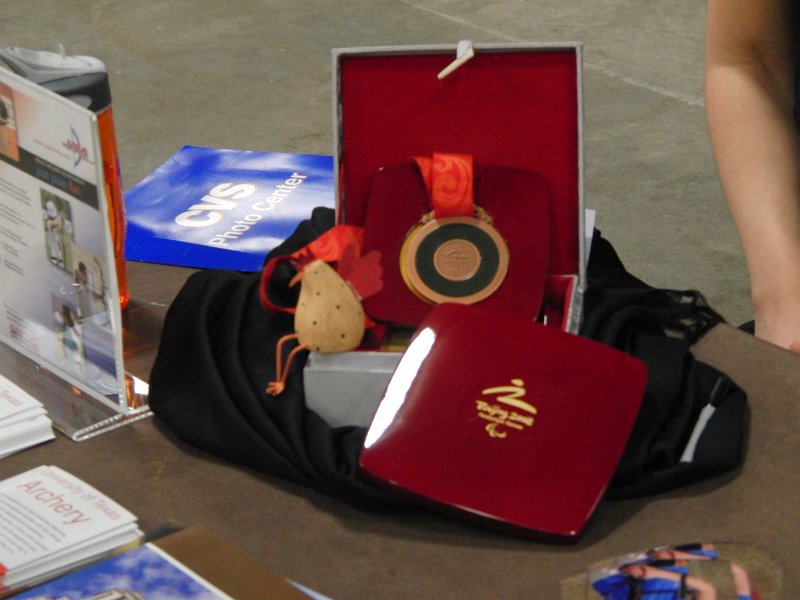 CIMG5728.JPG - Hans' birdie and the Beijing medal from 2008